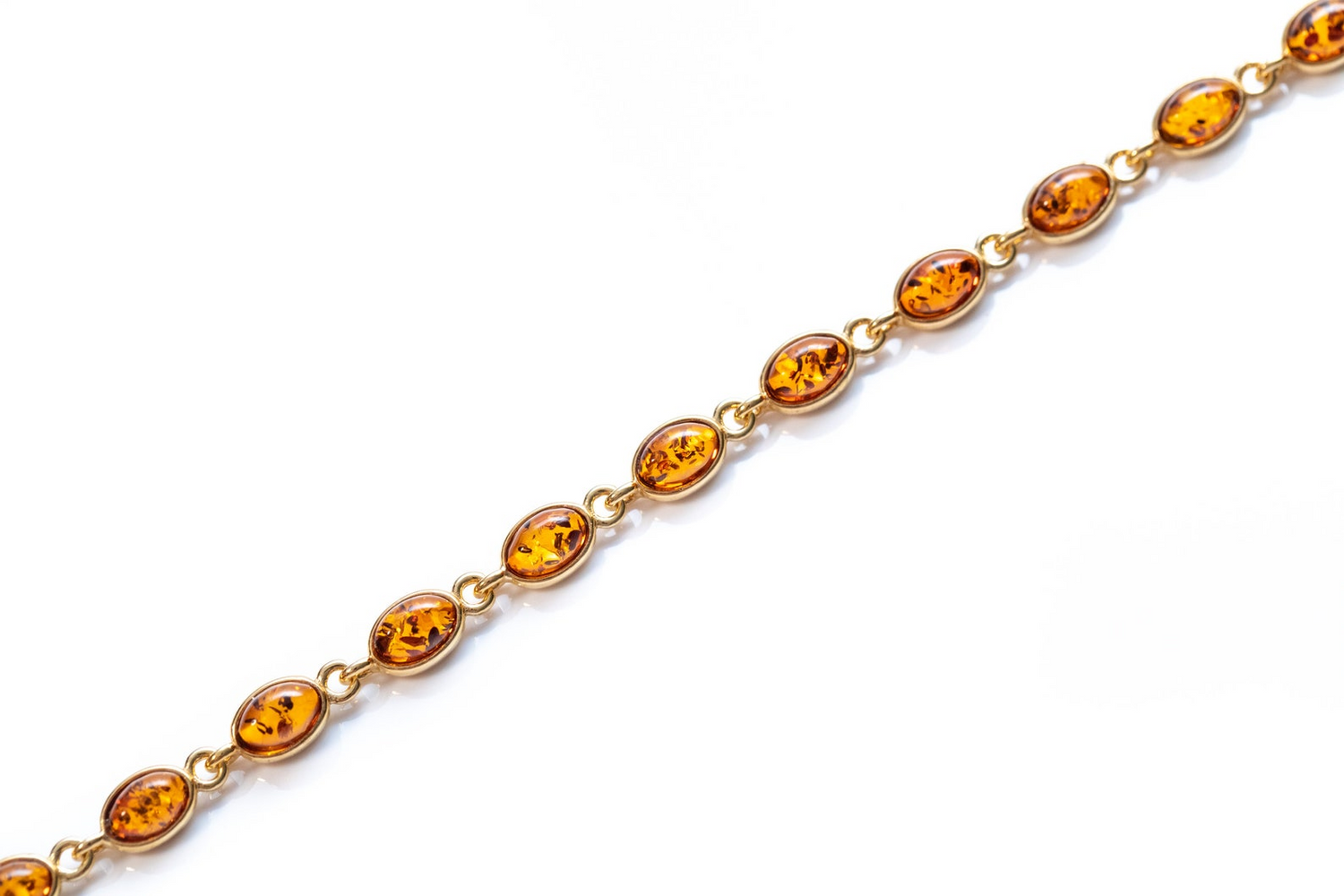 Pulsera ovalada delicada bañada en oro