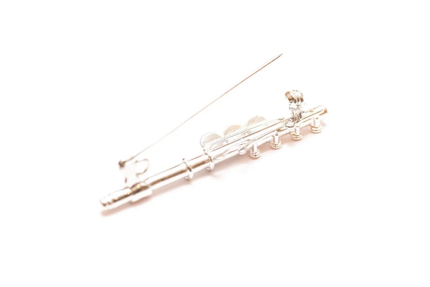 Broche de flauta de ámbar y plata