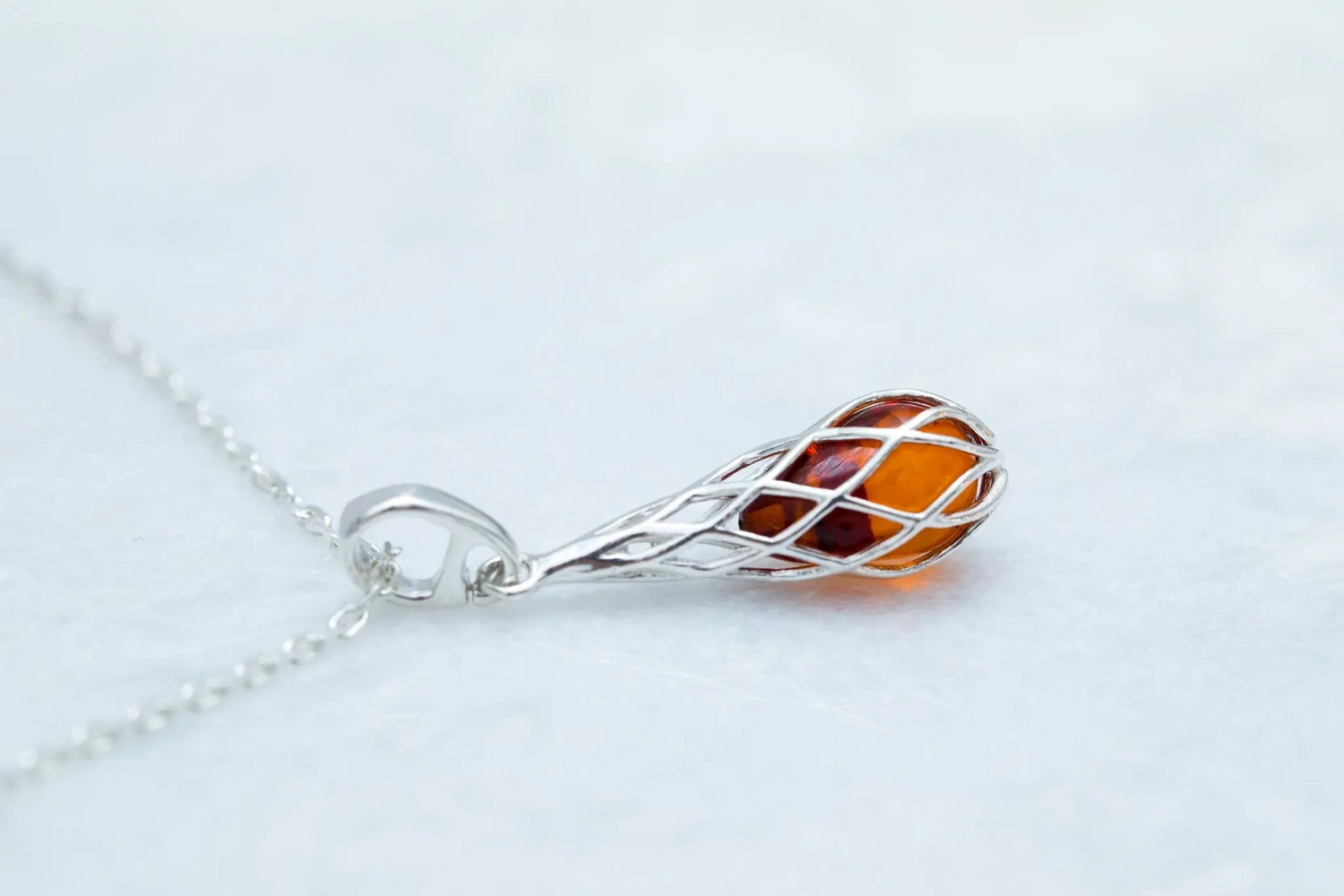 Caged Teardrop Amber Pendant