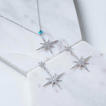 Petite Star Burst Drop Earrings Silver.