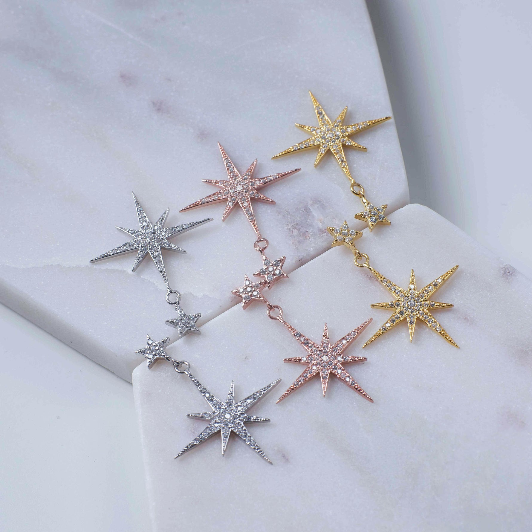 Petite Star Burst Drop Earrings Silver.