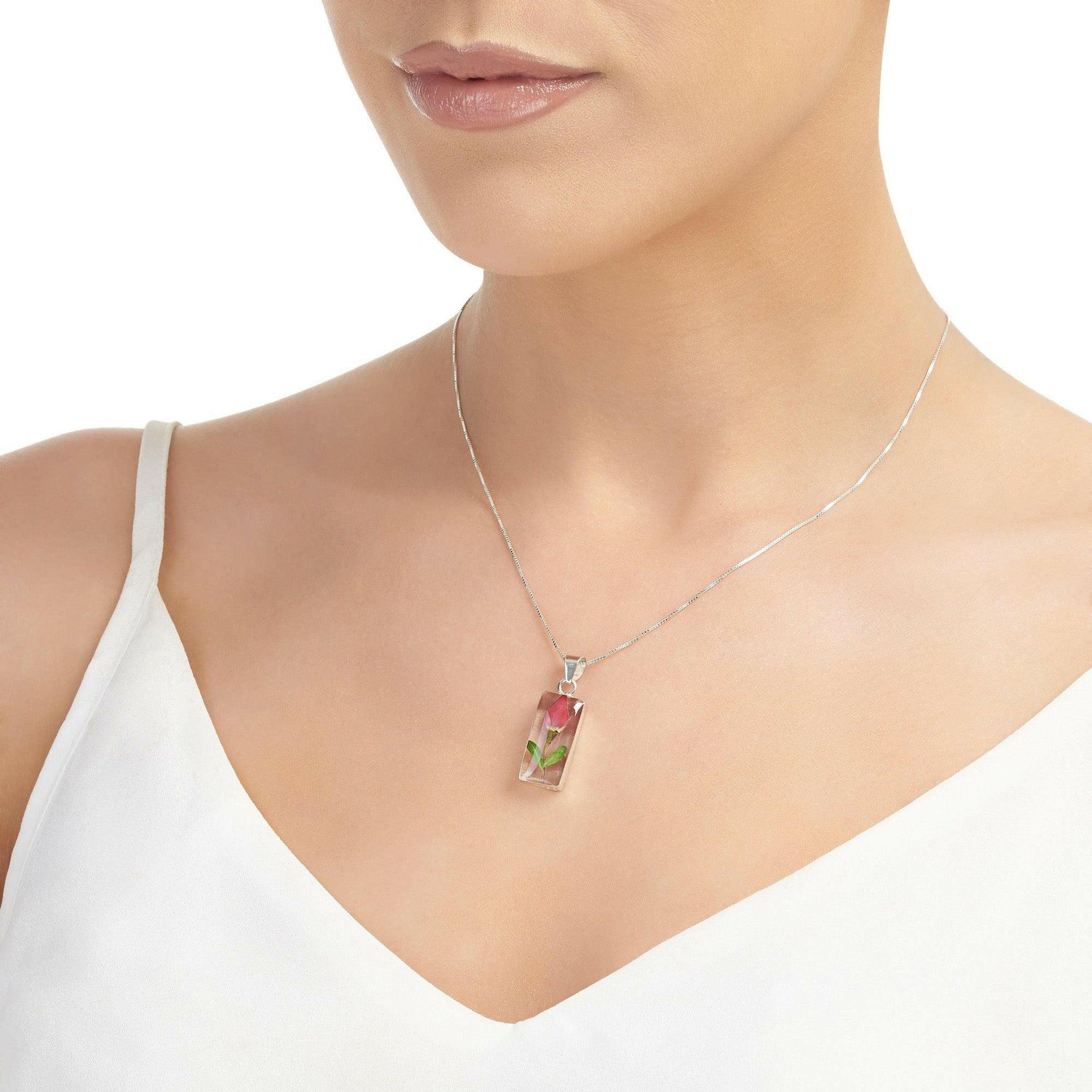 Miniature rose necklace by  Shrieking Violet® Sterling silver oval.