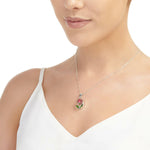 Miniature rose necklace by  Shrieking Violet® Sterling silver oval.