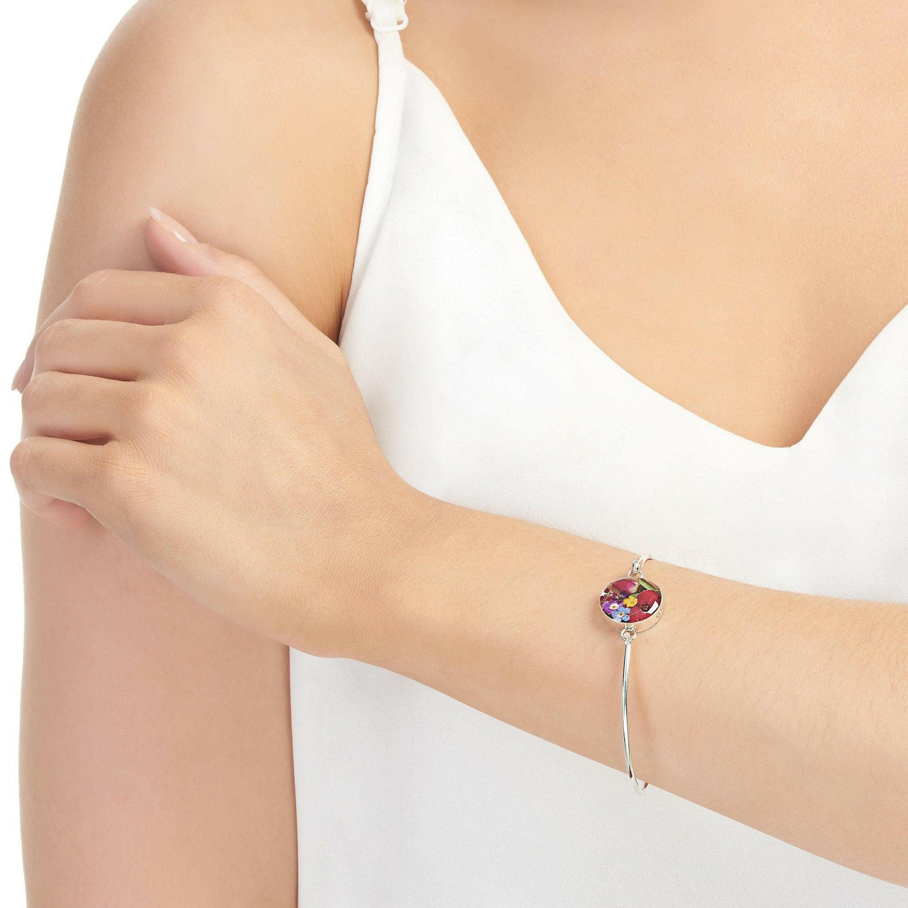 Sterling silver bangle with real flowers by  Shrieking Violet® Round.