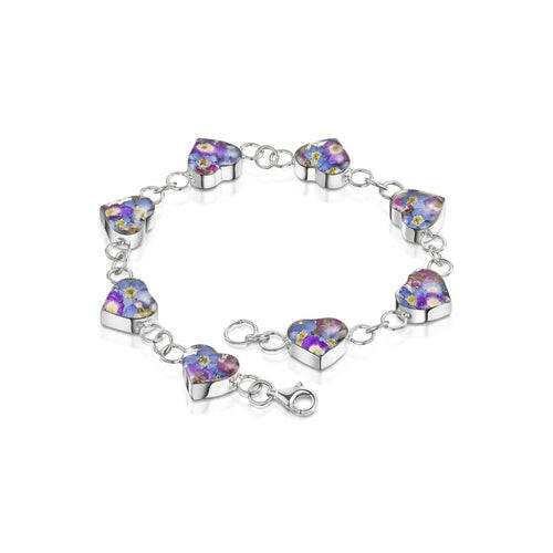 Sterling silver bracelet. Heart shapes filled with tiny purple.