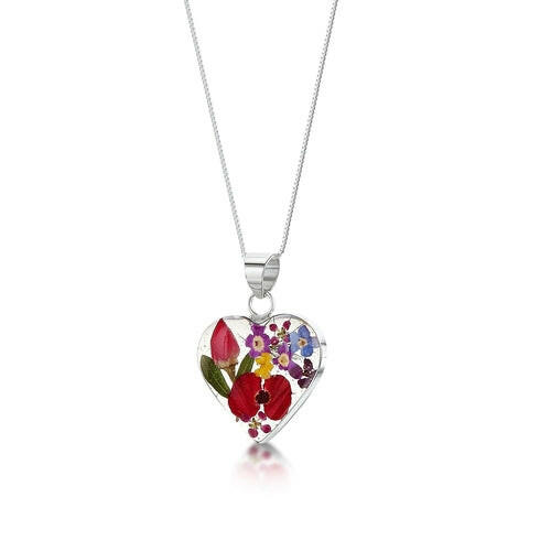 Sterling silver heart-shaped pendant necklace with real flowers.